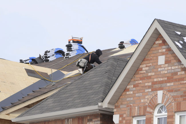 roofers working